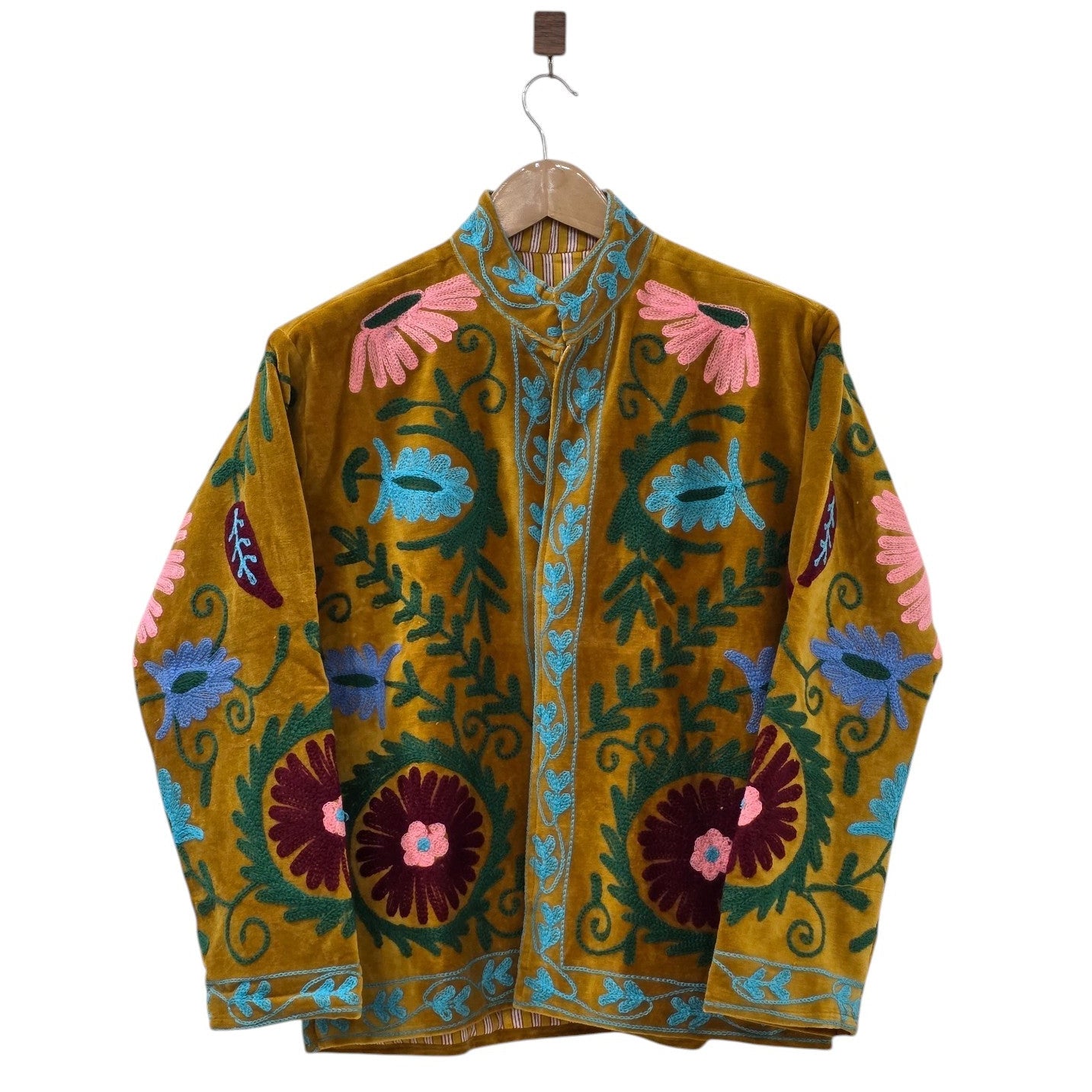 Mustard yellow velvet Suzani jacket featuring colorful hand-embroidered pink, blue, and burgundy flowers with green botanical vines.