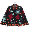 Front view of an open-style handmade black textured cotton TNT short jacket featuring vibrant red palm trees, light blue suns and waves, and orange heart Suzani embroidery . 